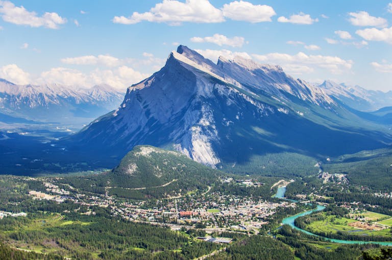 A stunning view of Mount Rundle overlooking Banff townsite and Bow River.