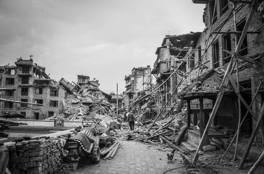 Black and white image depicting earthquake devastation and destruction in Bhaktapur, Nepal.